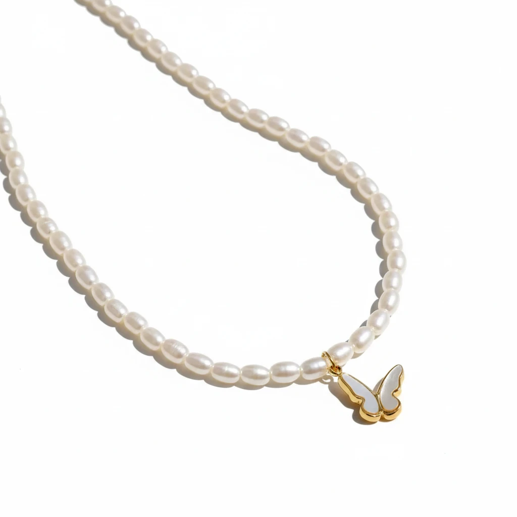White Pearl Strand Necklace with Shell Pearl Butterfly Charm - Image 4