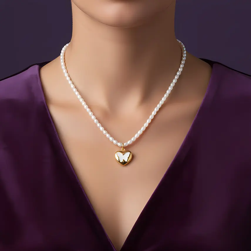 Alternative view of White Pearl Strand Necklace with Puffy Heart Butterfly Charm
