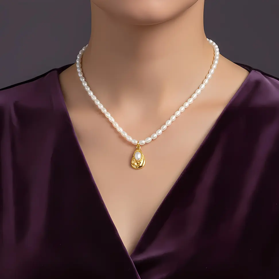 Alternative view of White Pearl Strand Necklace with Textured Teardrop Pearl Charm