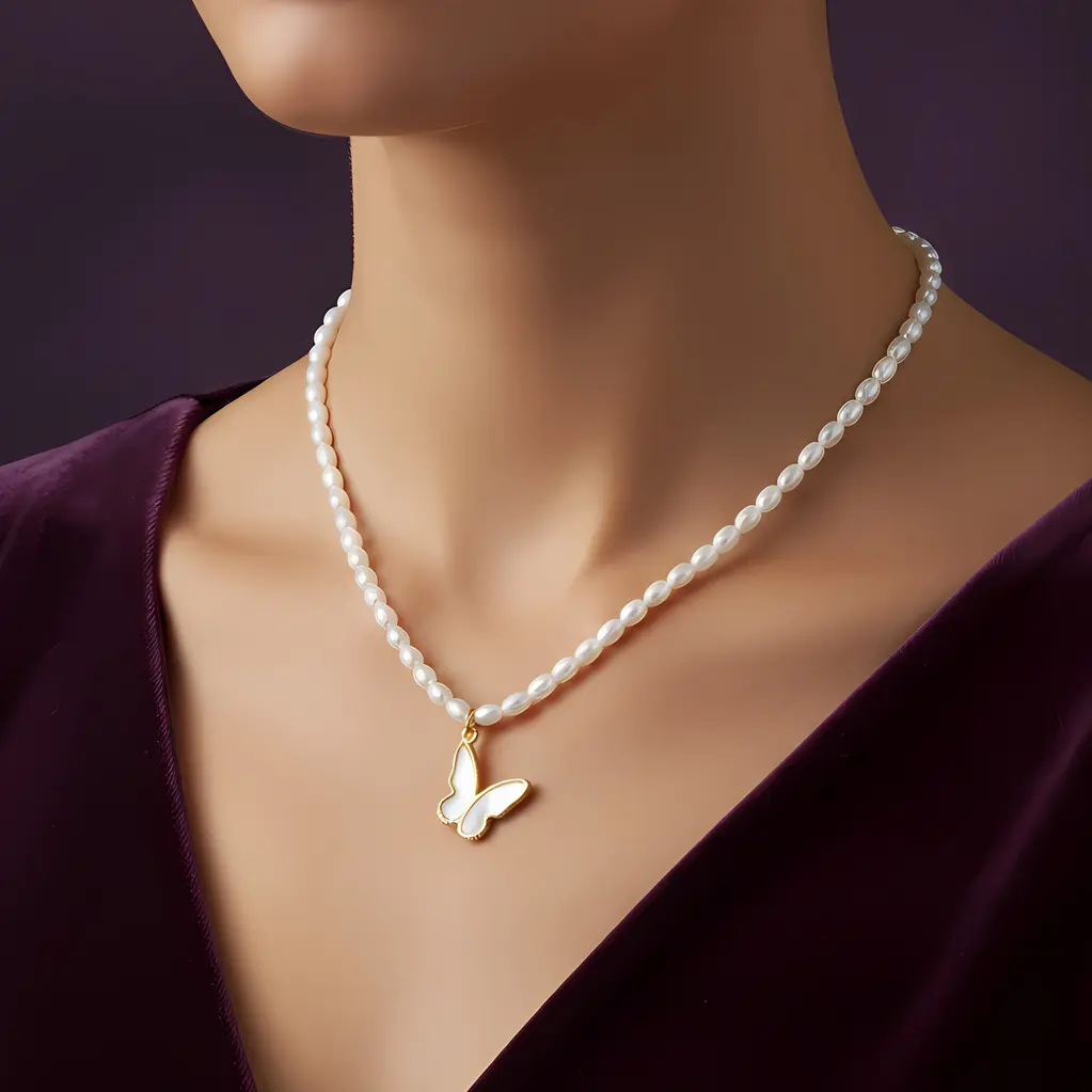 Alternative view of White Pearl Strand Necklace with Shell Pearl Butterfly Charm
