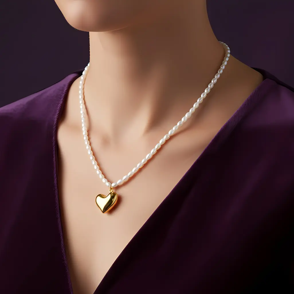 Alternative view of White Pearl Strand Necklace with Large Polished Puffy Heart Charm