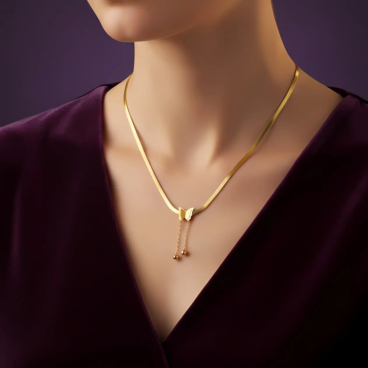 Alternative view of Gold Butterfly Herringbone Chain Necklace with Ball Drop